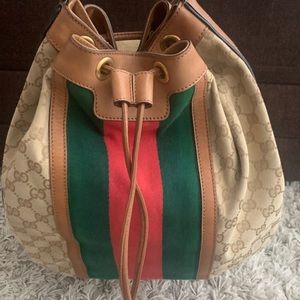 Authentic Gucci Rania canvas with bamboo tassels